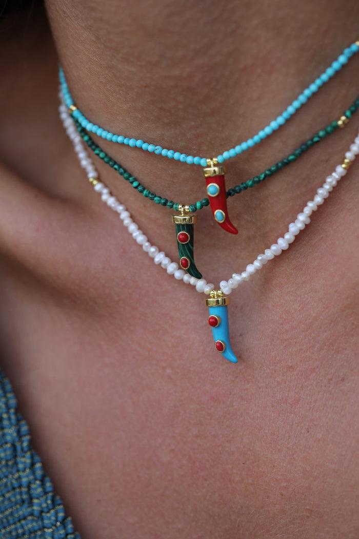 Eshvi Pearl Necklace With Fang Charm