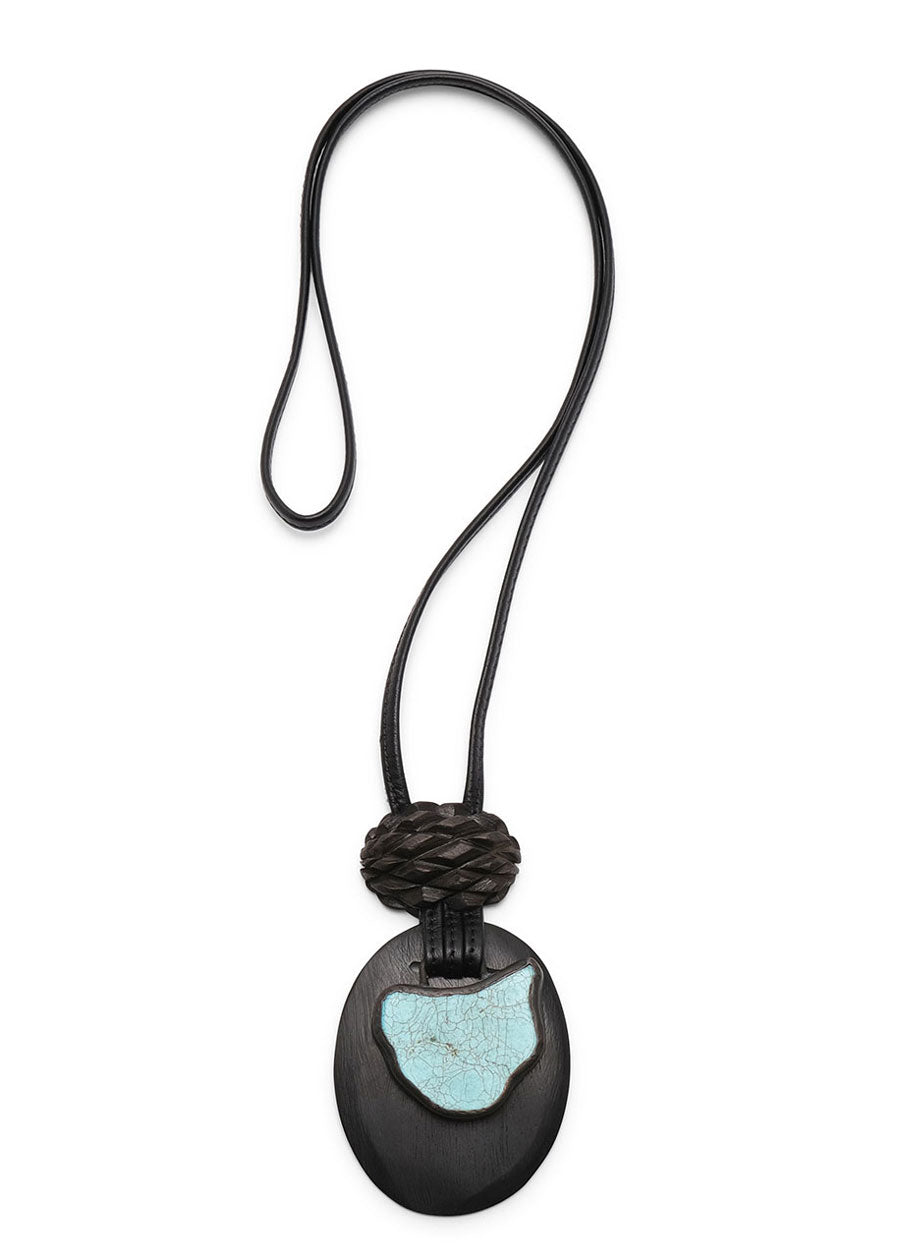 eskandar double oval kamagong wood & stone leather pendant with carved pineapple