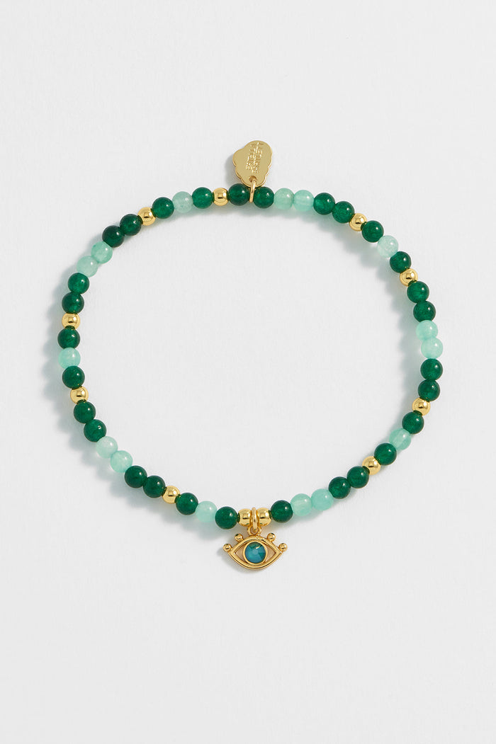 Estella Bartlett Beaded Evil Eye Charm Bracelet Gold Plated | Green Quartz Packaging Message: Positive Vibes