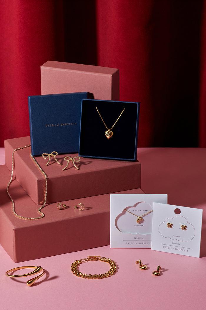 estella Bartlett Bow Tennis Chain Earrings Gold Plated