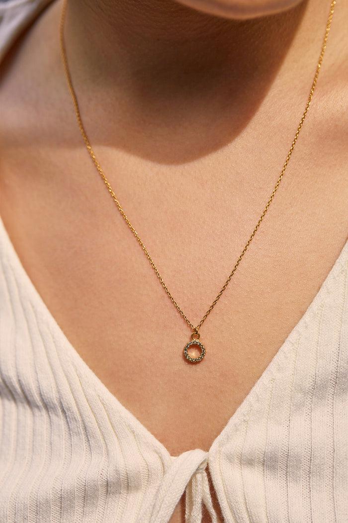 Estella Bartlett Circle CZ Pendant Necklace Gold Plated | Green Packaging Message: ONE OF A KIND