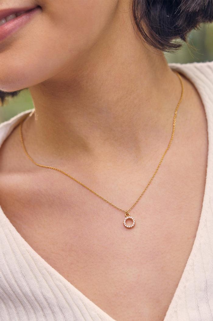 Estella Bartlett Circle CZ Pendant Necklace Gold Plated | Pink Packaging Message: ONE OF A KIND