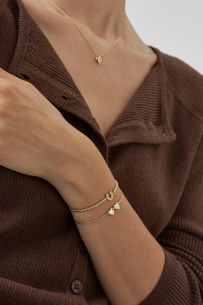 Estella Bartlett Connected Hearts Bracelet Gold Plated Packaging Message: You Are Some Kind Of Wonderful