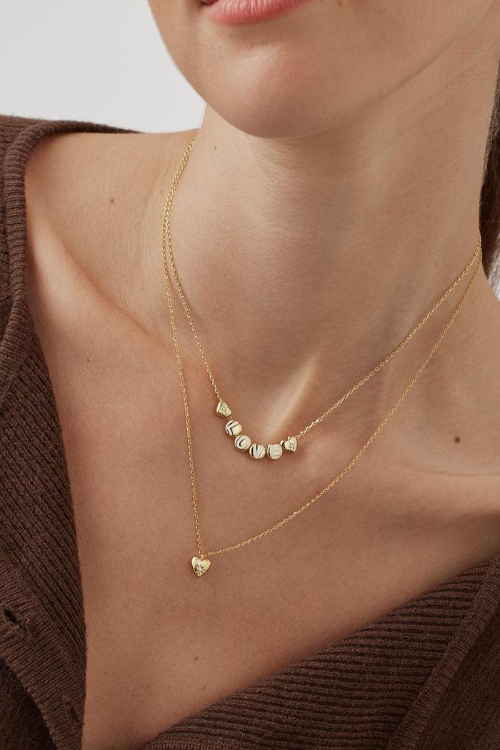 Estella Bartlett CZ Star Puffy Heart Necklace Gold Plated Packaging Message: Love Is All Around