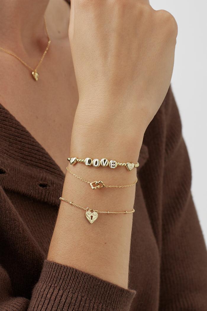 Estella Bartlett Double-Linked Flower Bracelet Gold Plated Packaging Message: Treasure Me