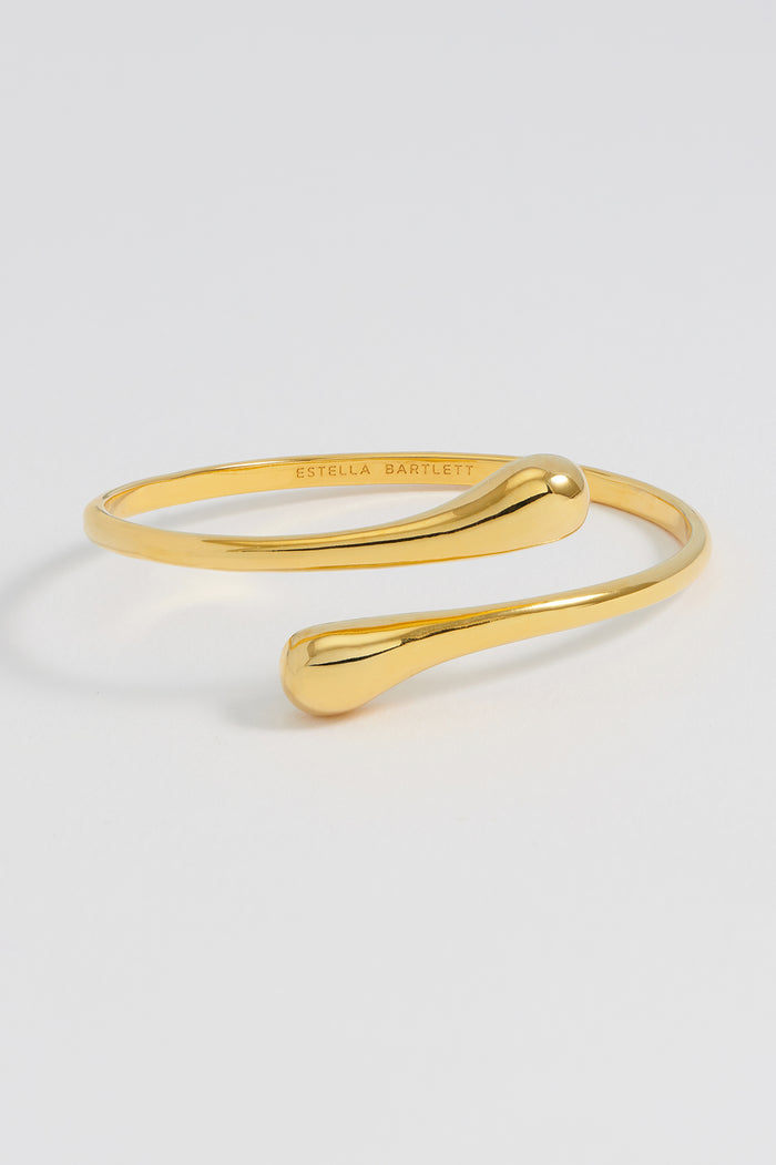 Estella Bartlett Droplet Open Bangle Gold Plated