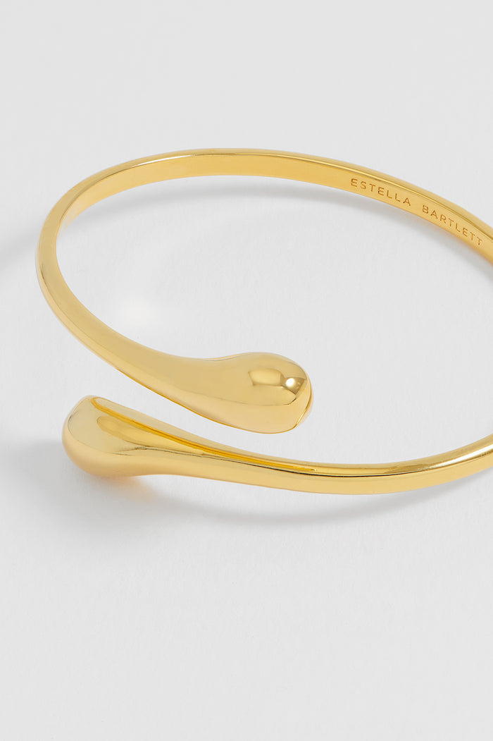 estella bartlett Droplet Open Bangle Gold Plated