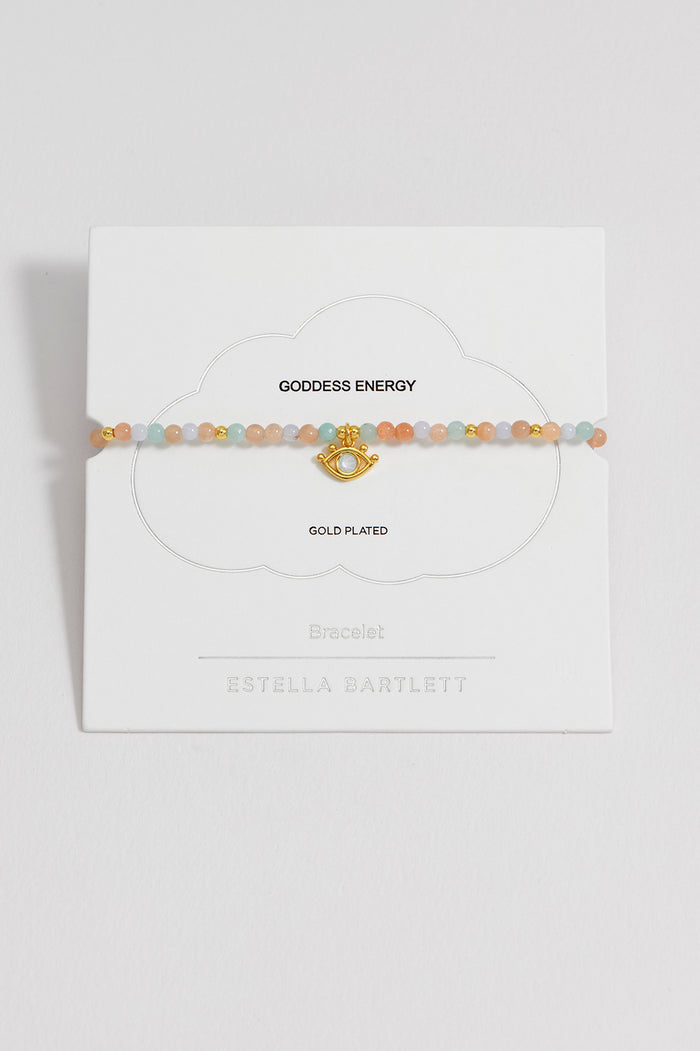 estella bartlett Evil Eye Charm Bracelet Gold Plated | Peach Moonstone and Lime Aventurine Packaging Message: GODDESS ENERGY