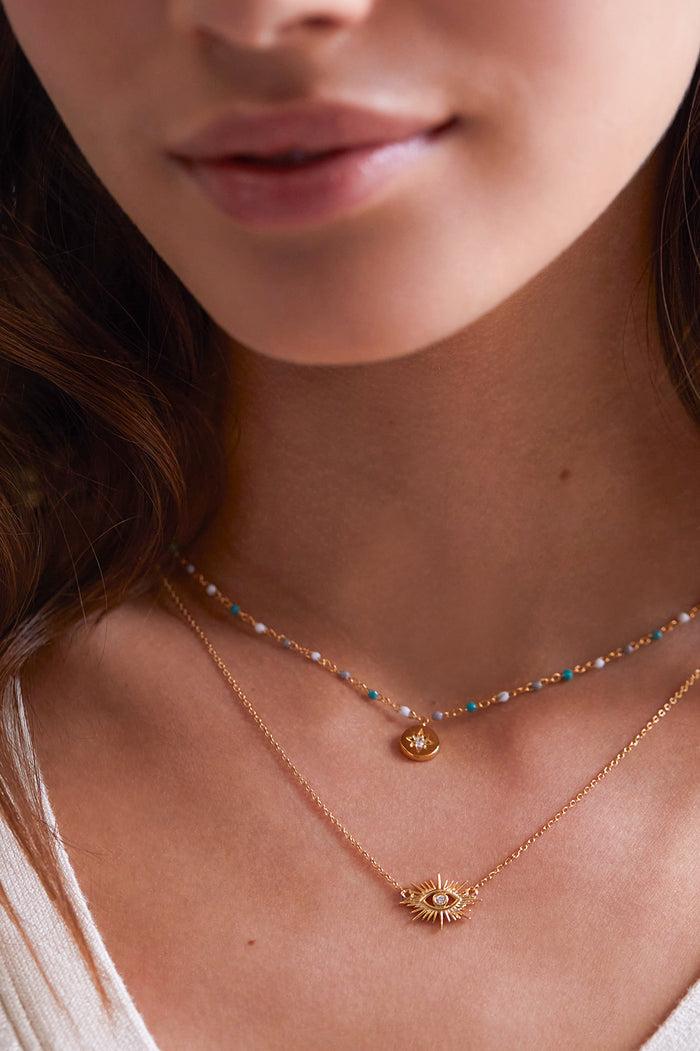 Estella Bartlett Evil Eye Star Burst Necklace Gold Plated Packaging Message: ONE OF A KIND