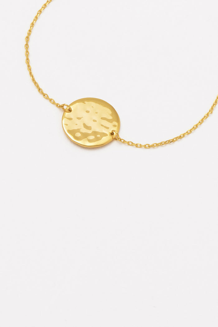 Estella Bartlett Hammered Disc Bracelet Gold Plated Packaging Message: All You Need Is Love