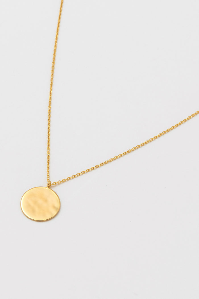 Estella Bartlett Hammered Disc Pendant Gold Plated Packaging Message: She Believed She Could So She Did