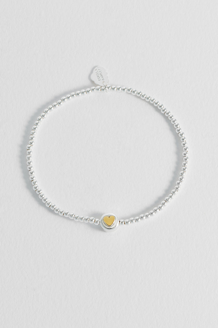 Estella Bartlett Heart Disc Bead Bracelet Silver Plated Packaging Message: All Your Need Is Love