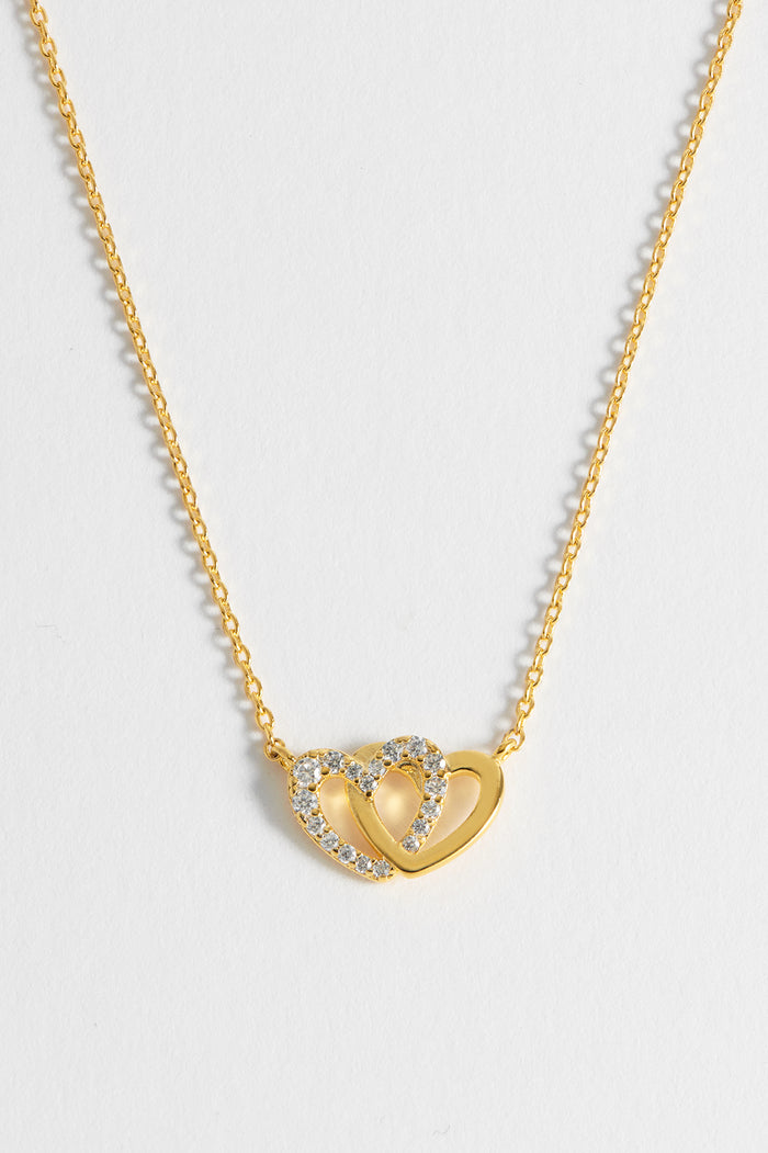 Estella Bartlett Interlocking Heart CZ Necklace Gold Plated Packaging Message: Soft Heart Sweet Soul