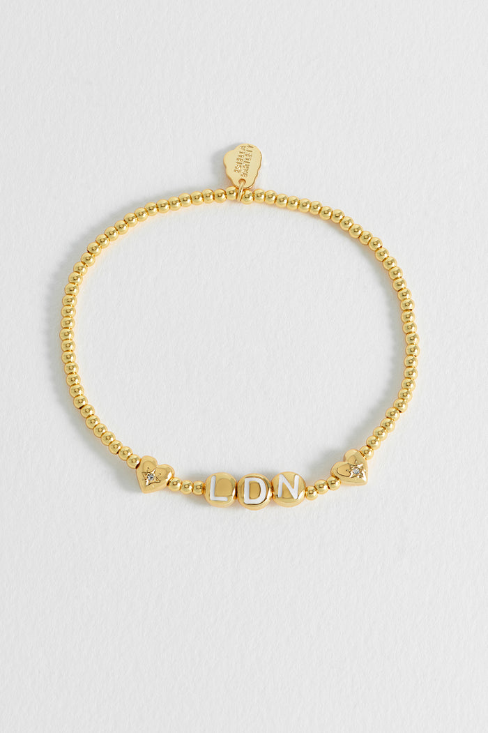 Estella Bartlett London Letter Bead Bracelet Gold Plated Packaging Message: Love