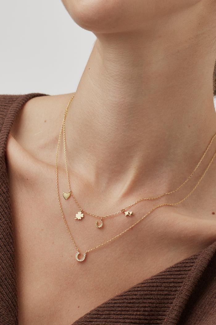 Estella Bartlett Love And Luck Charm Necklace Gold Plated Packaging Message: Luck