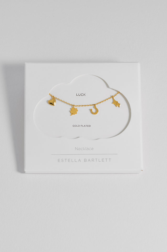 estella bartlett Love and Luck Charm Necklace Gold Plated Packaging Message: Luck