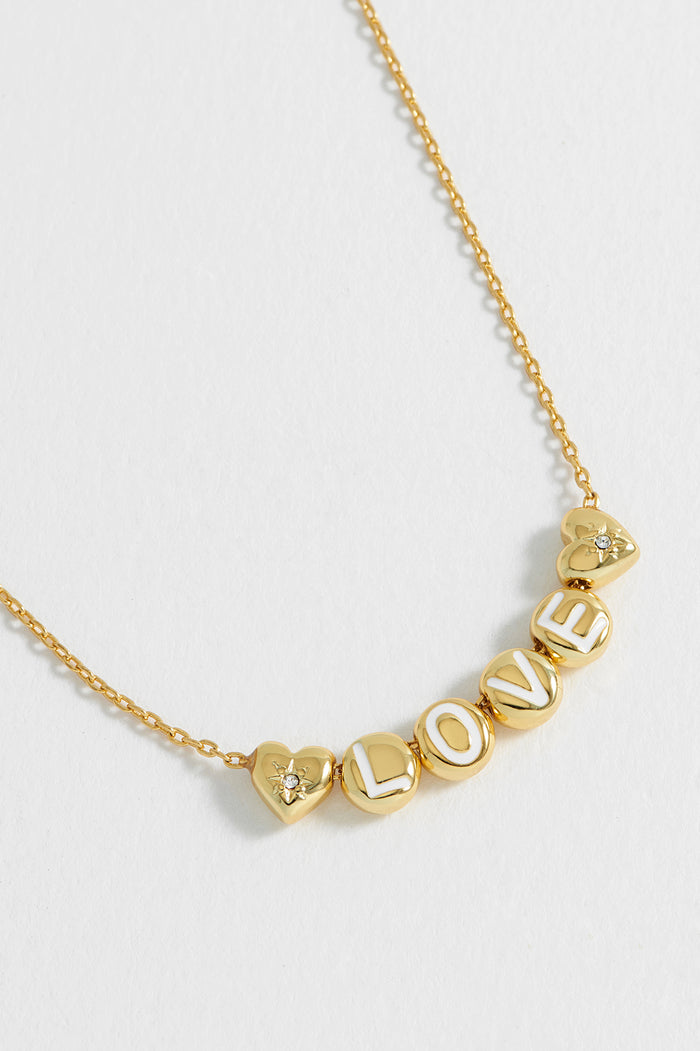 Estella Bartlett Love Letter Bead Necklace Gold Plated Packaging Message: All You Need Is Love