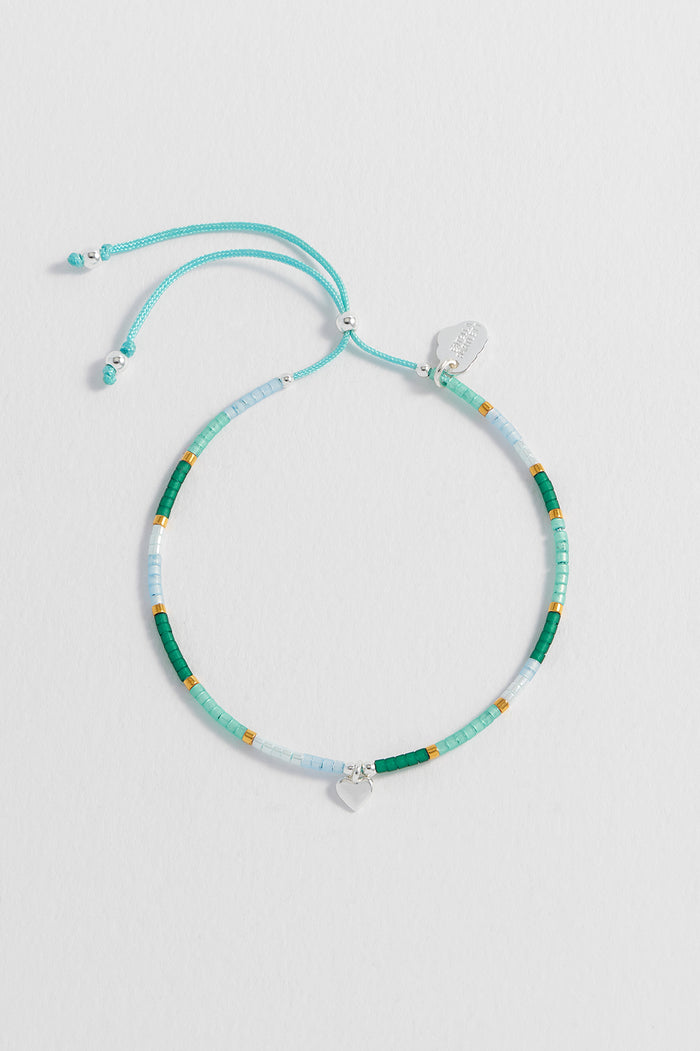 Estella Bartlett Mini Heart Miyuki Bracelet Gold And Silver Plated | Green Packaging Message: She Believed She Could So She Did