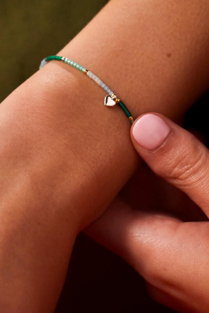 Estella Bartlett Mini Heart Miyuki Bracelet Gold And Silver Plated | Green Packaging Message: She Believed She Could So She Did