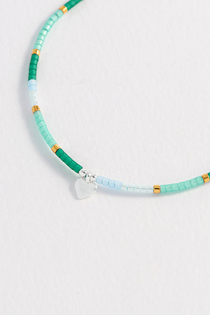 Estella Bartlett Mini Heart Miyuki Bracelet Gold And Silver Plated | Green Packaging Message: She Believed She Could So She Did