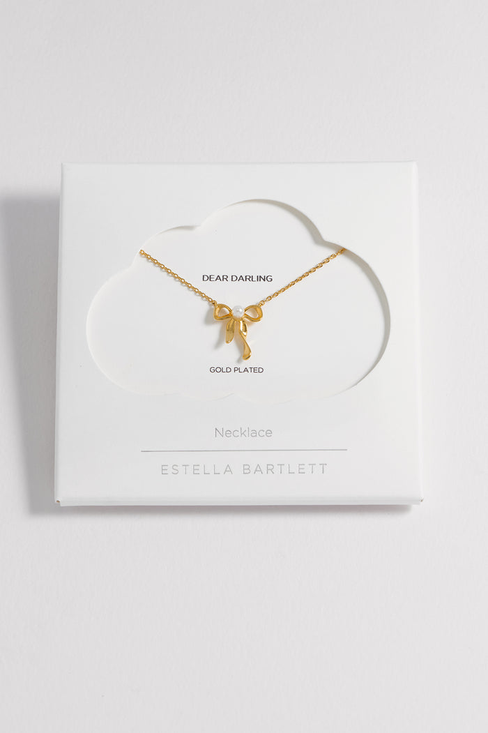 estella bartlett Pearl Bow Necklace Gold Plated | Pearl Packaging Message: LOVELY LITTLE THINGS