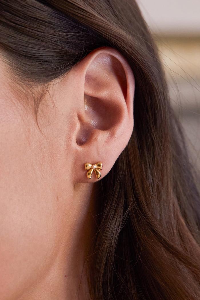 Estella Bartlett Pearl Bow Stud Earrings Gold Plated