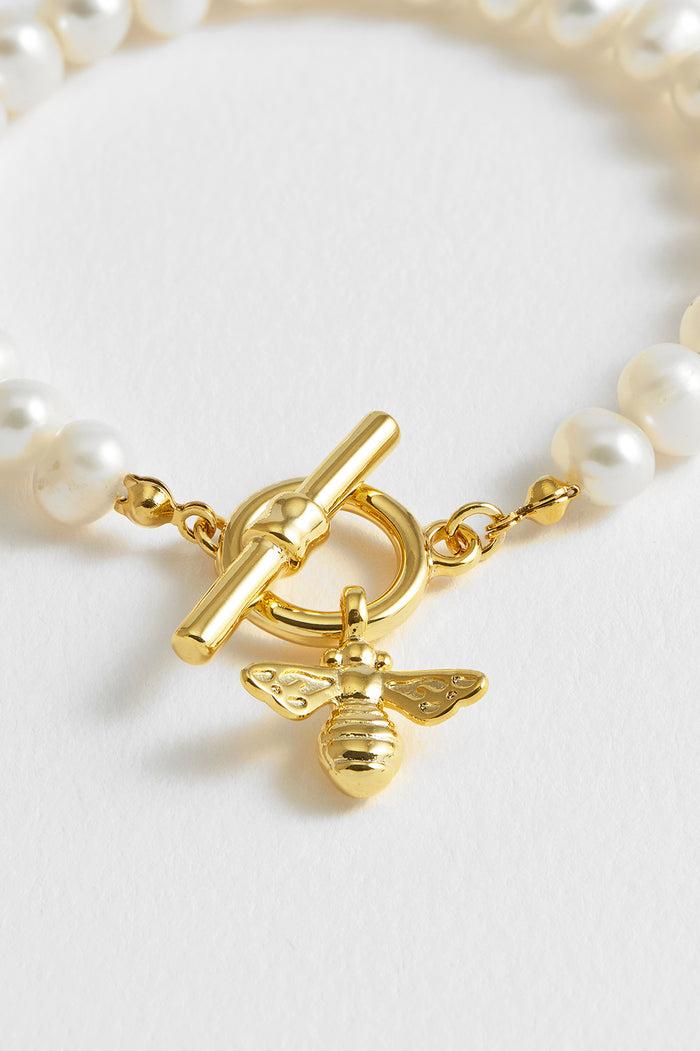 Estella Bartlett Pearl Bumble Bee T-Bar Bracelet Gold Plated | Pearl