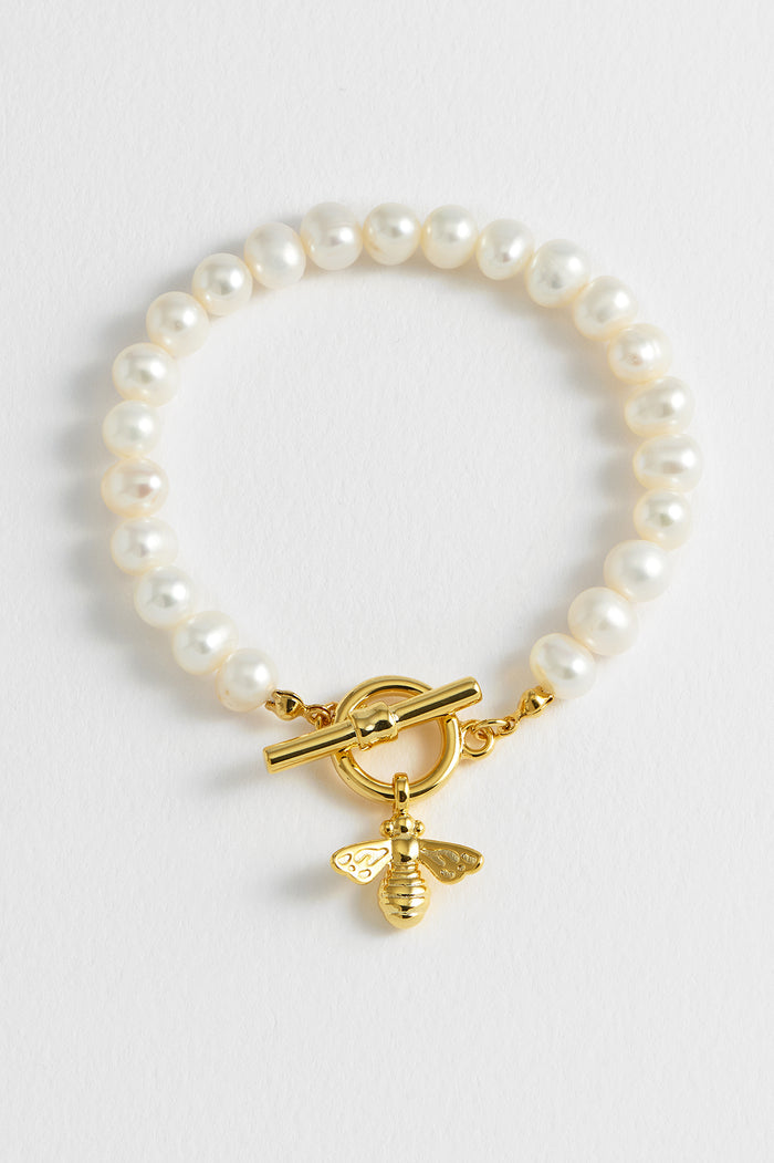 estella bartlett Pearl Bumble Bee T-Bar Bracelet Gold Plated | Pearl