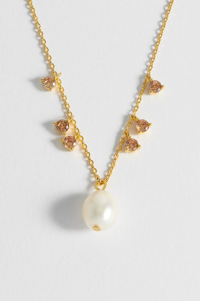 Estella Bartlett Pearl CZ Pendant Necklace Gold Plated | Pearl Orange Packaging Message: Shine Bright
