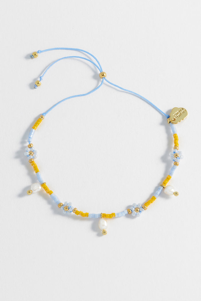 Estella Bartlett Pearl Flower Miyuki Bracelet Gold Plated | Pearl Lilac And Yellow Packaging Message: Follow The Fun