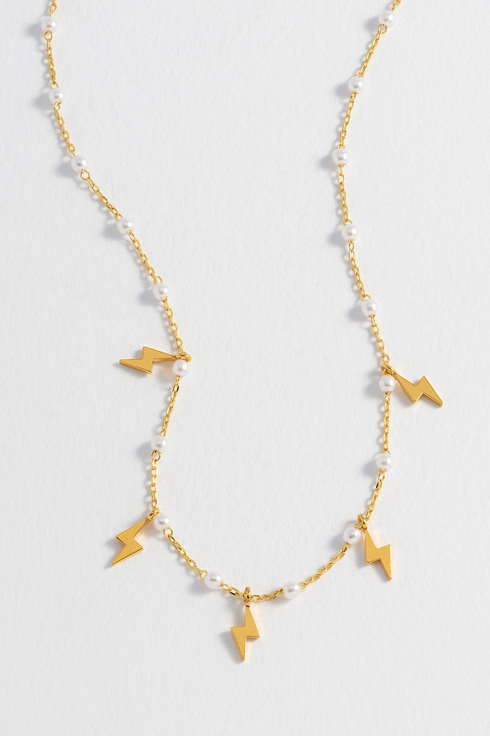 Estella Bartlett Pearl Power Bolt Charm Necklace Gold Plated | Pearl Packaging Message: I Am Powerful