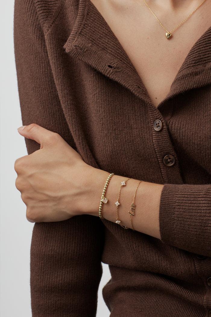 Estella Bartlett Pink Pearl Heart Bracelet Gold Plated | Pearl Packaging Message: With Love