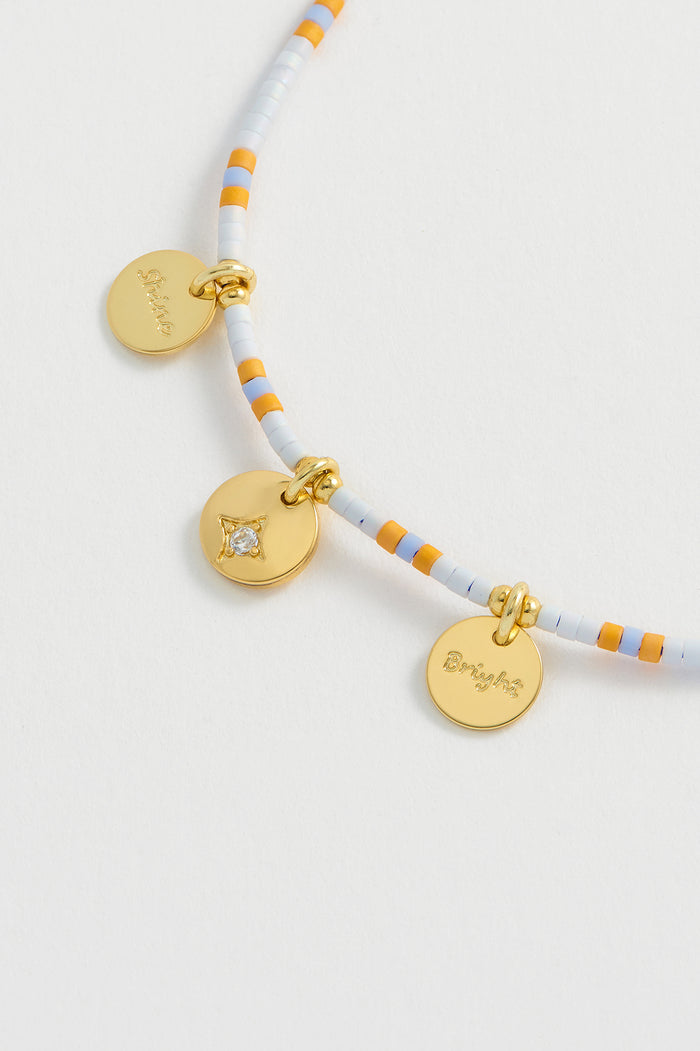 Estella Bartlett Shine Bright Beaded Charm Bracelet Gold Plated | Multi Packaging Message: Live As You Dream