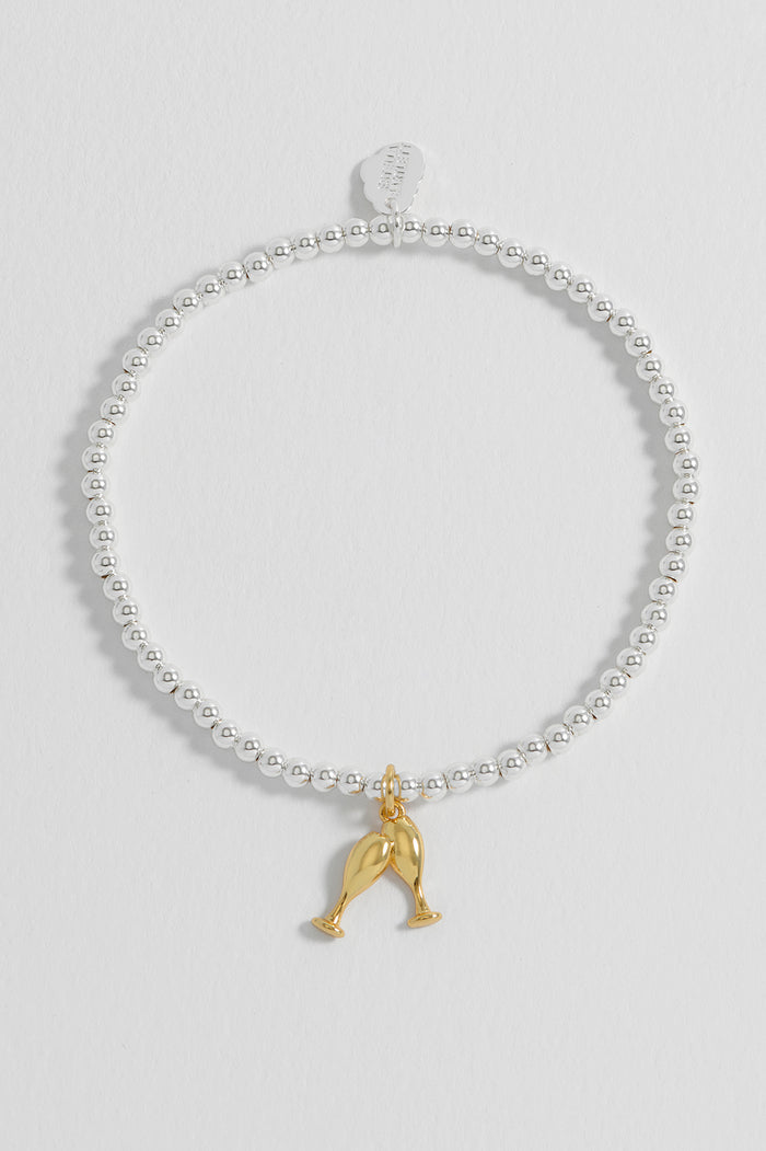 Estella Bartlett Sienna Beaded Champagne Charm Bracelet Gold And Silver Plated Packaging Message: LET'S CELEBRATE