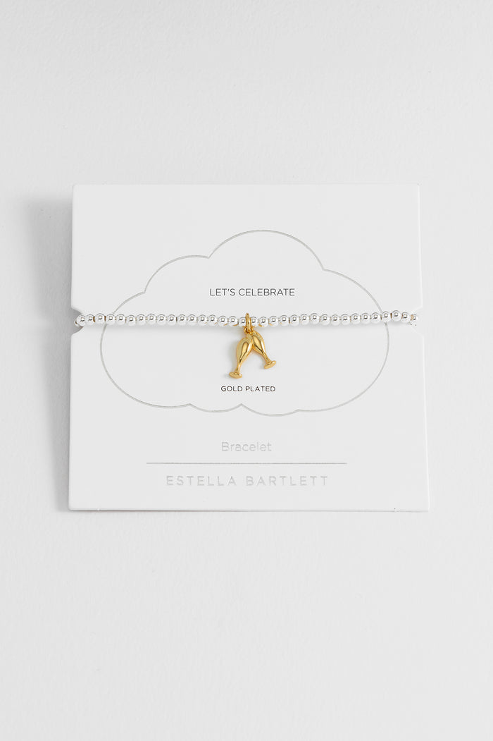 estella bartlett Sienna Beaded Champagne Charm Bracelet Gold and Silver Plated Packaging Message: LET'S CELEBRATE