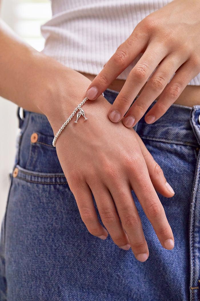 Estella Bartlett Sienna Beaded Champagne Charm Bracelet Silver Plated Packaging Message: LET'S CELEBRATE