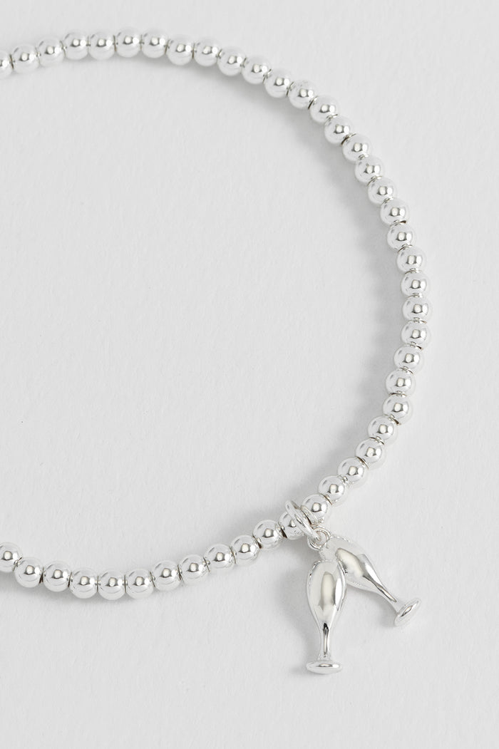 Estella Bartlett Sienna Beaded Champagne Charm Bracelet Silver Plated Packaging Message: LET'S CELEBRATE