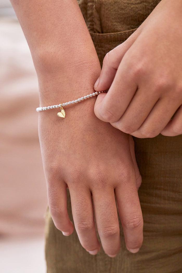 Estella Bartlett Sienna Beaded Folded Heart Charm Bracelet Gold And Silver Plated Packaging Message: MUM IN A MILLION
