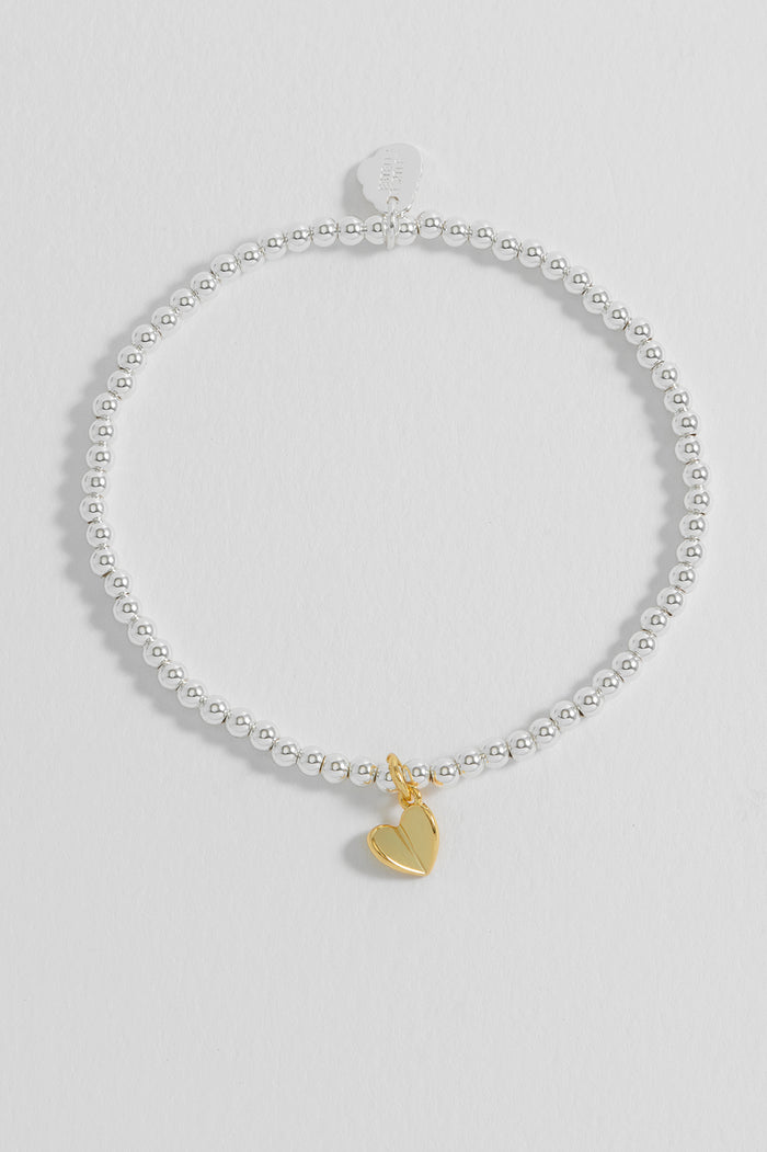 Estella Bartlett Sienna Beaded Folded Heart Charm Bracelet Gold And Silver Plated Packaging Message: MUM IN A MILLION