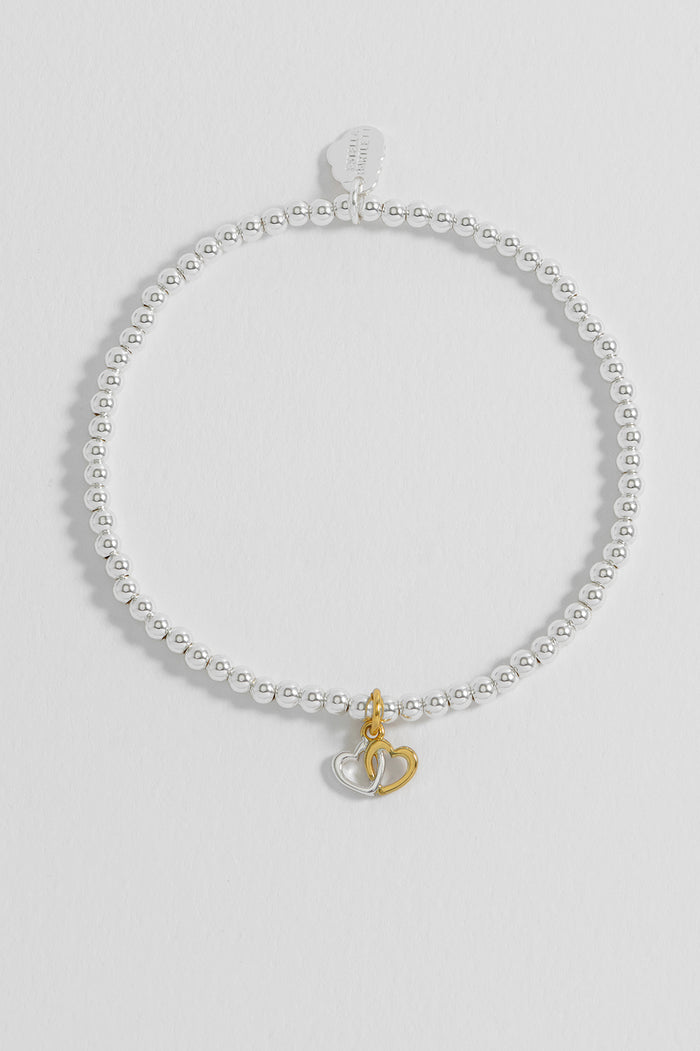 Estella Bartlett Sienna Beaded Interlinked Heart Charm Bracelet Gold And Silver Plated Packaging Message: FRIENDS FOREVER