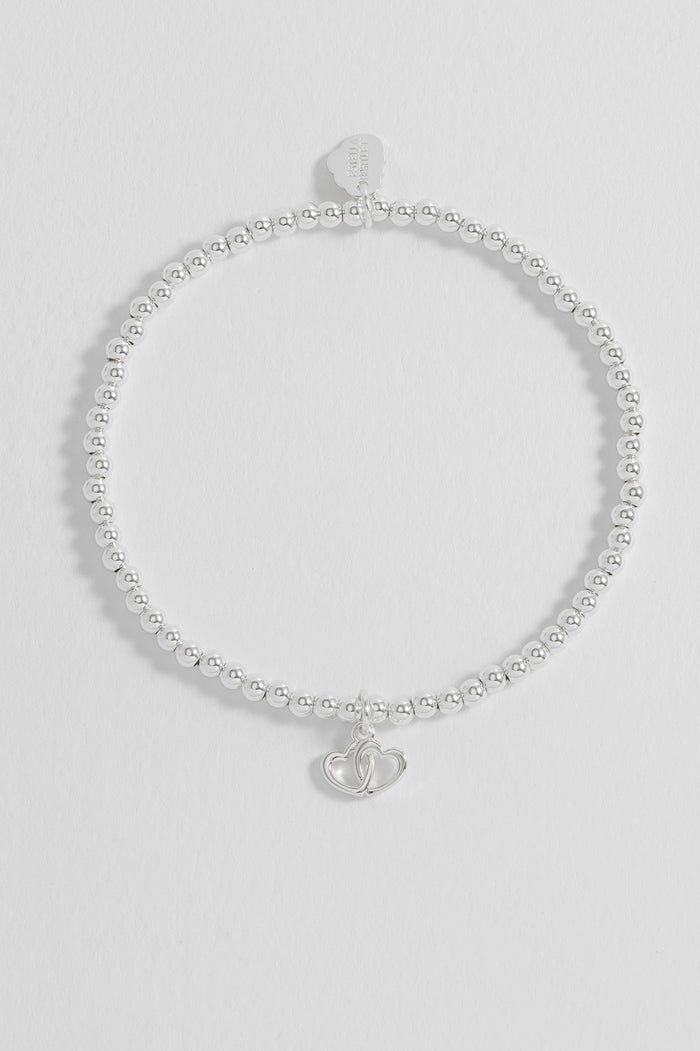 Estella Bartlett Sienna Beaded Interlinked Heart Charm Bracelet Silver Plated Packaging Message: FRIENDS FOREVER