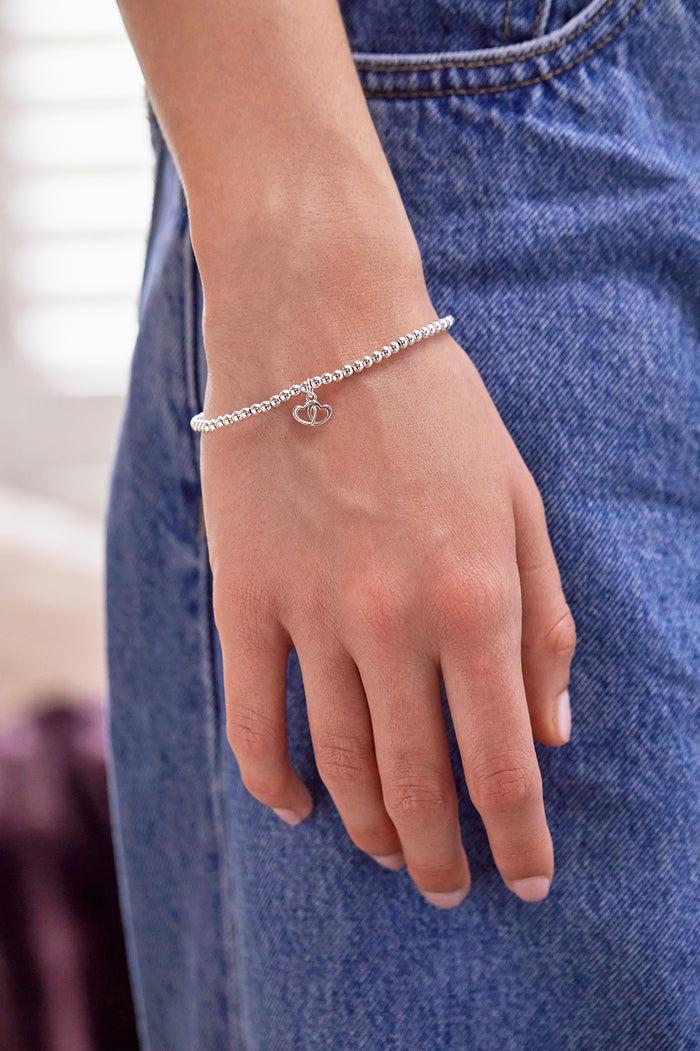 Estella Bartlett Sienna Beaded Interlinked Heart Charm Bracelet Silver Plated Packaging Message: FRIENDS FOREVER