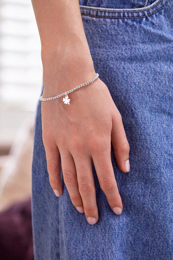 Estella Bartlett Sienna Beaded Lucky Clover Charm Bracelet Silver Plated Packaging Message: GOOD LUCK