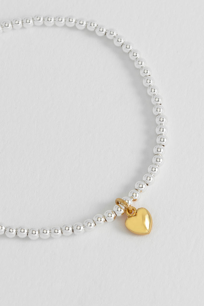Estella Bartlett Sienna Beaded Puffy Heart Charm Bracelet Gold And Silver Plated Packaging Message: WITH LOVE