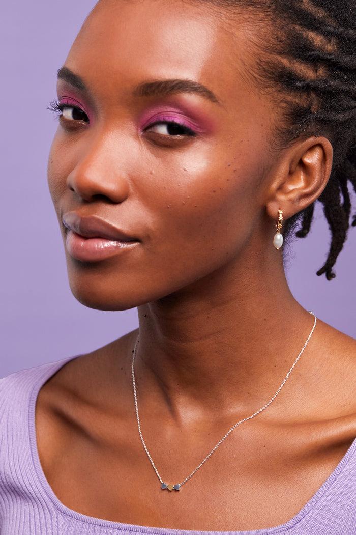 Estella Bartlett Trio Heart Necklace Silver And Gold Plated Packaging Message: Love