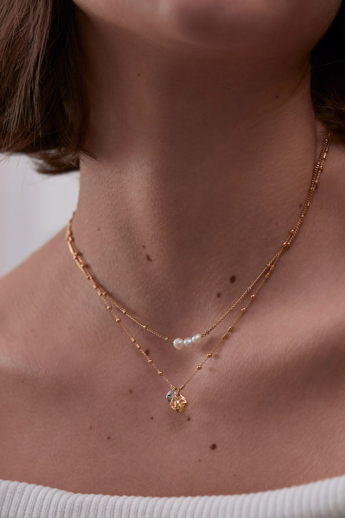 Estella Bartlett Triple Beaded Chain And Molton Pebbles Necklace Gold Plated Packaging Message: Treasure Me