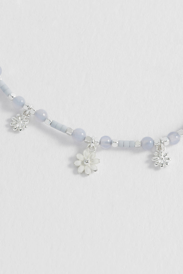 Estella Bartlett Triple Flower White Enamel Sienna Bracelet Silver Plated | Blue Lace Agate Packaging Message: Wildflower