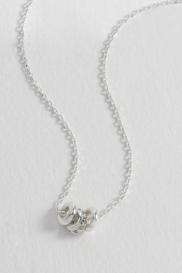 Estella Bartlett Triple Pave Ring Necklace Silver Plated Packaging Message: SPECIAL SOMETHING