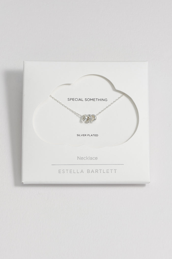 estella bartlett Triple Pave Ring Necklace Silver Plated Packaging Message: SPECIAL SOMETHING