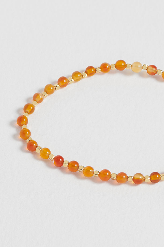 Estella Bartlett Wellness Carnelian Gemstone Amelia Bracelet Gold Plated | Courage Packaging Message: Courage